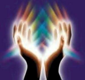 Healing energy radiating from open hands