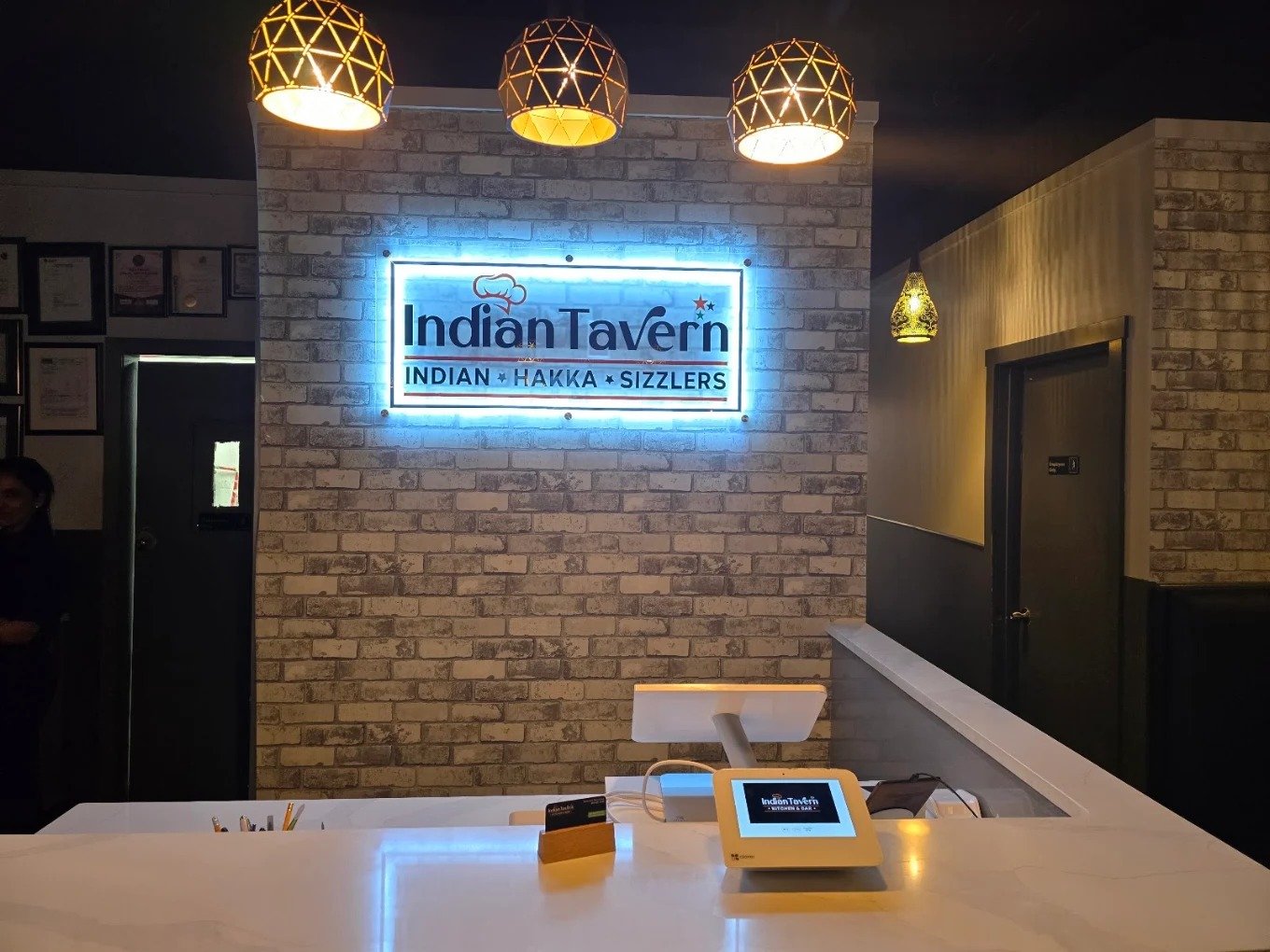 Warm dining room interior at Indian Tavern Kitchen & Bar Calgary