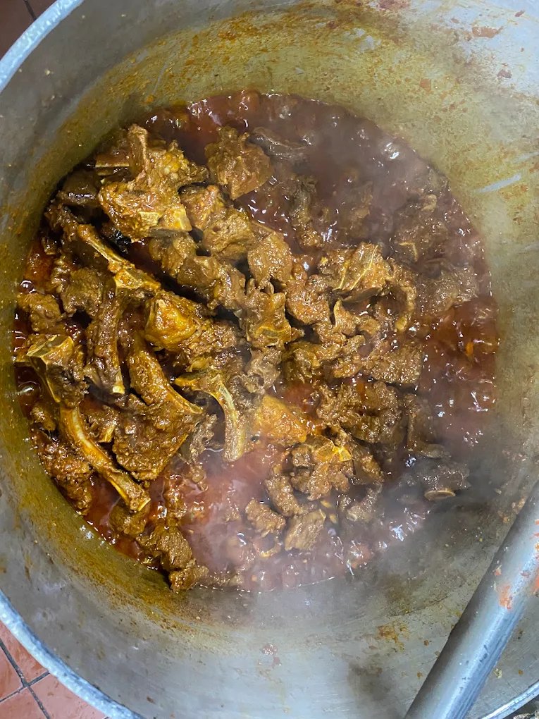 Slow-cooked goat curry at Mehfil Curry & Kebab