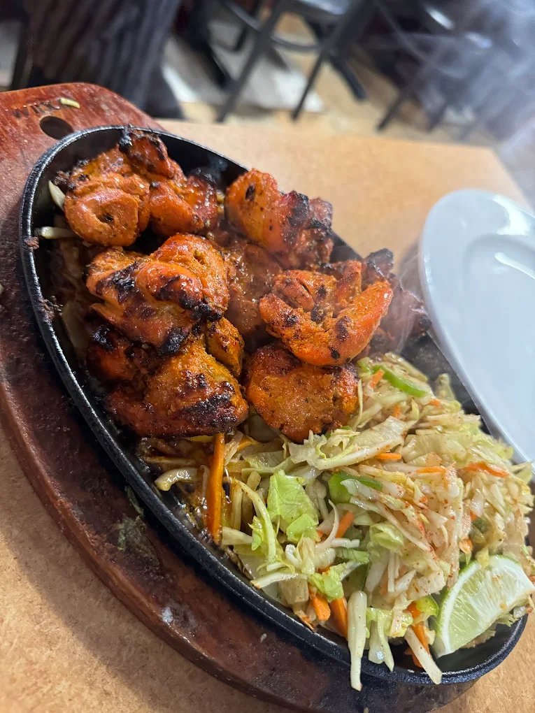 Sizzling tandoori chicken at Mehfil Curry & Kebab
