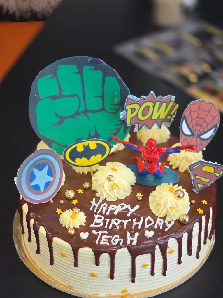 Superhero themed birthday cake