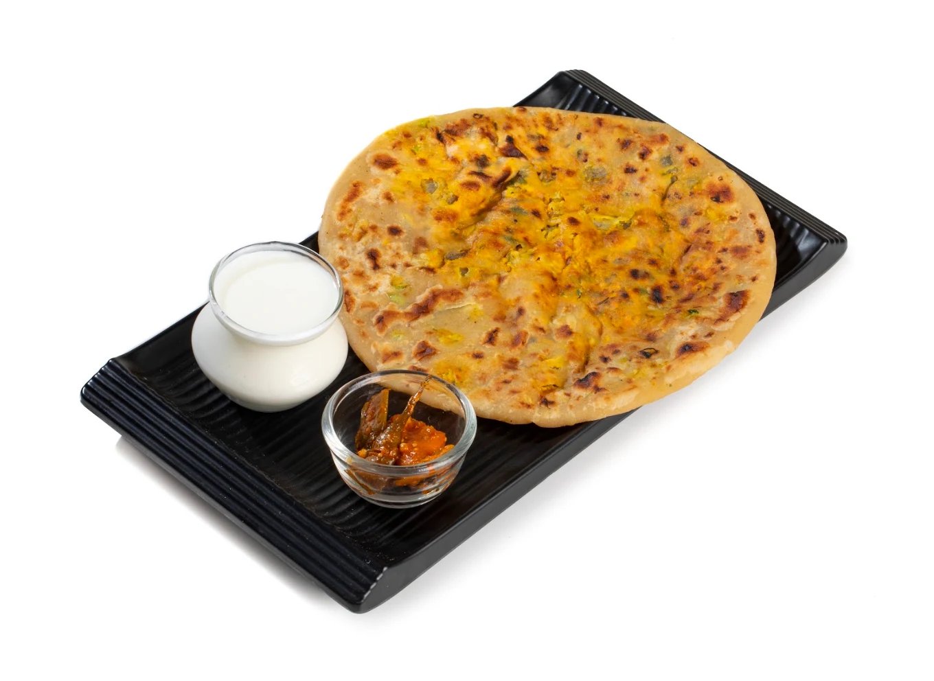 Stuffed paratha with yogurt and pickle from Famous Fast Food & Sweets