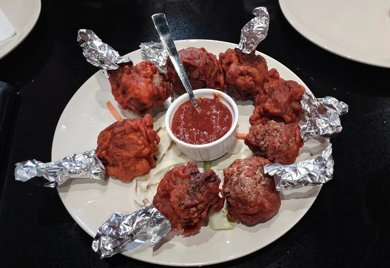 Chicken lollipop appetizer with dip