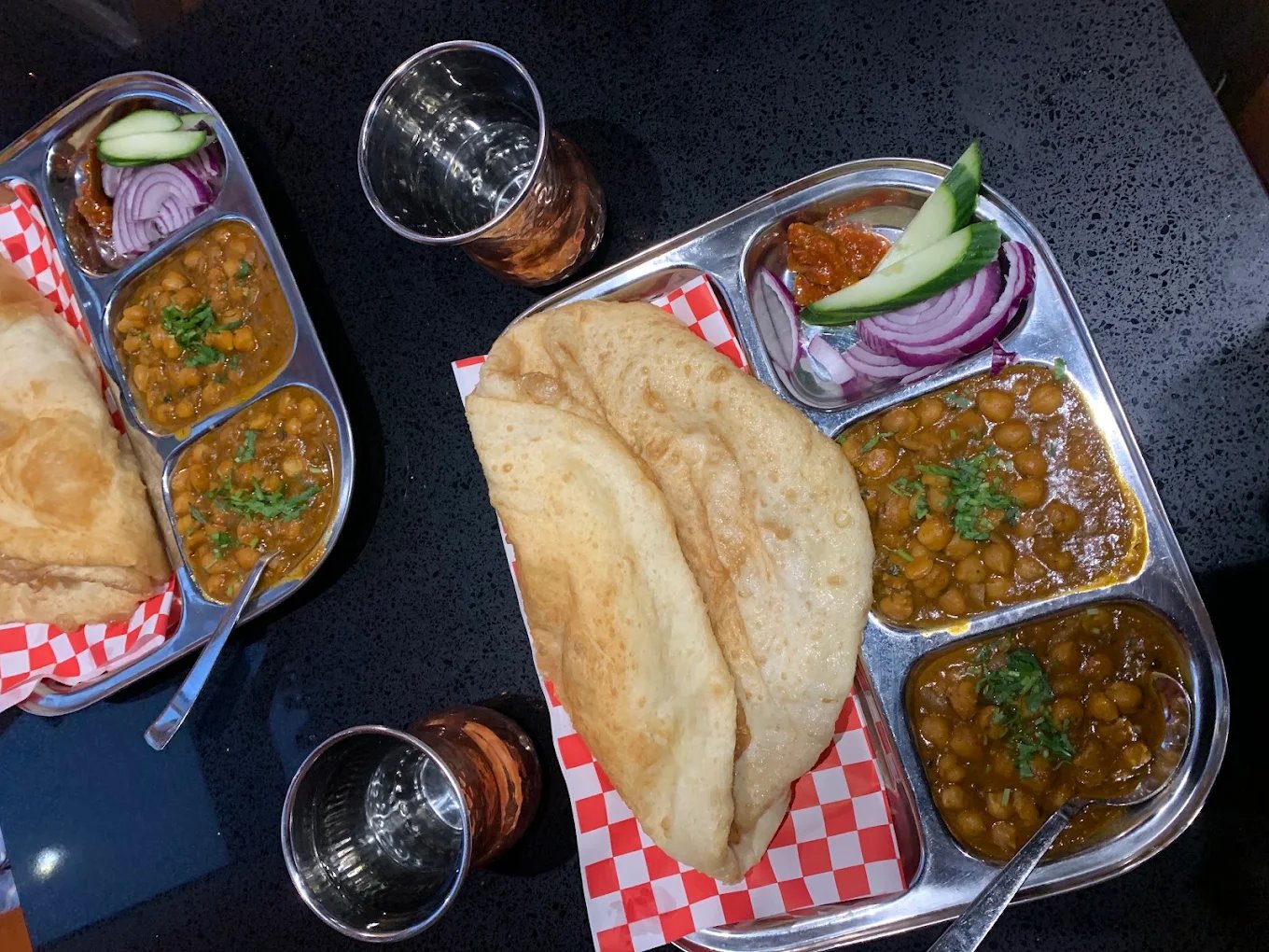 Cholle bhature thali with pickle and onions at Mehman Calgary