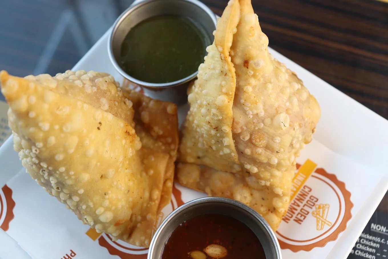 Vegetable samosas with chutneys