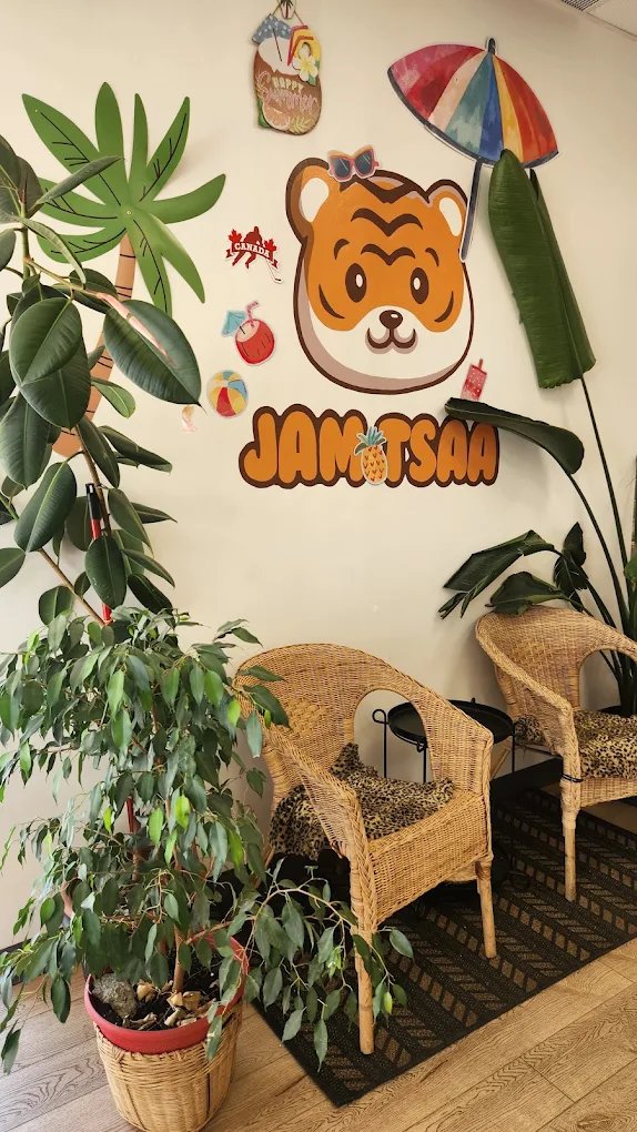 Jam Tsaa store interior with mural and plants