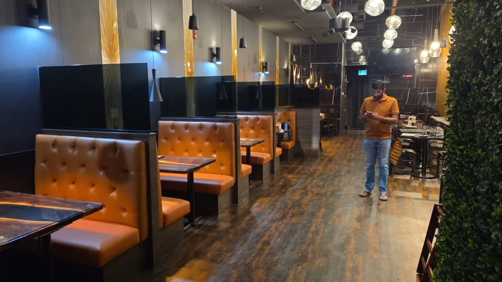 Restaurant booths and overhead lighting