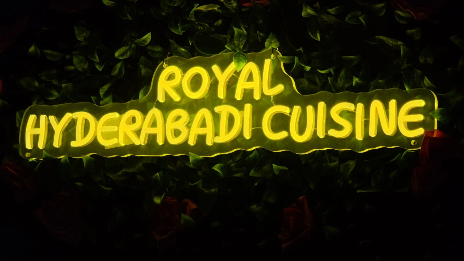 Illuminated Royal Hyderabadi Cuisine sign
