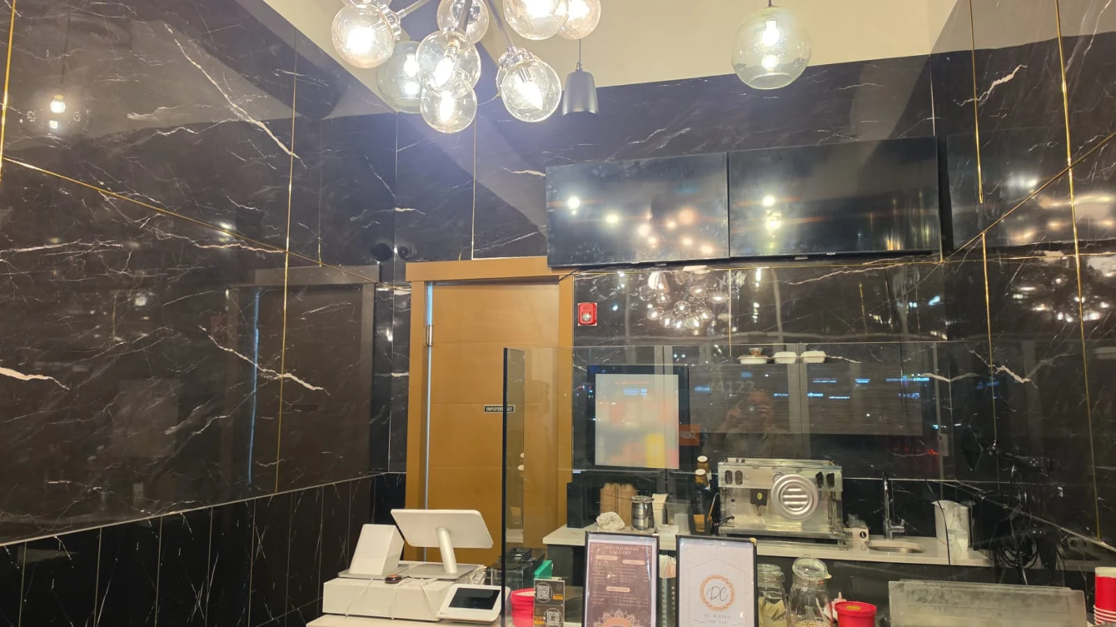 Restaurant counter with glowing pendant lights