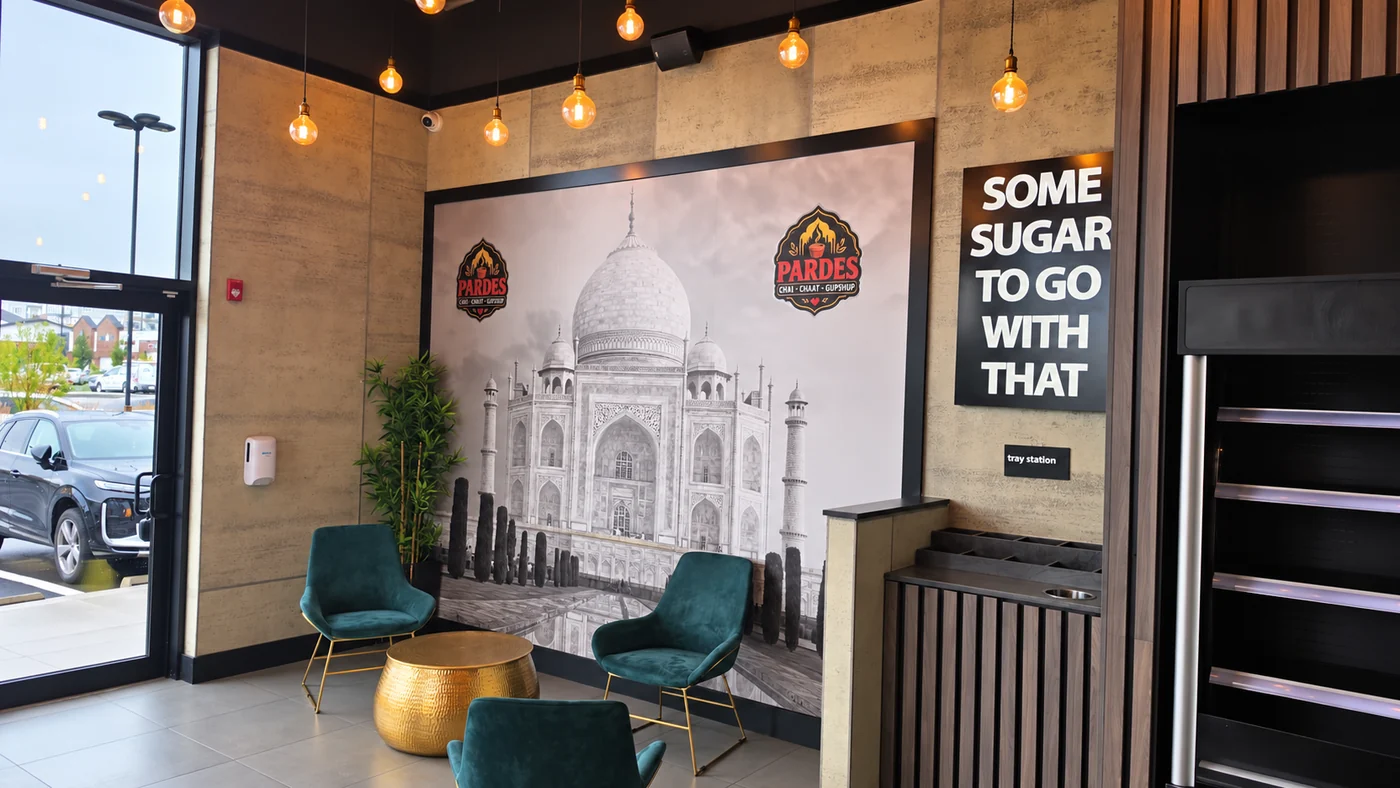 Pardes Carrington seating area with Taj Mahal wall art
