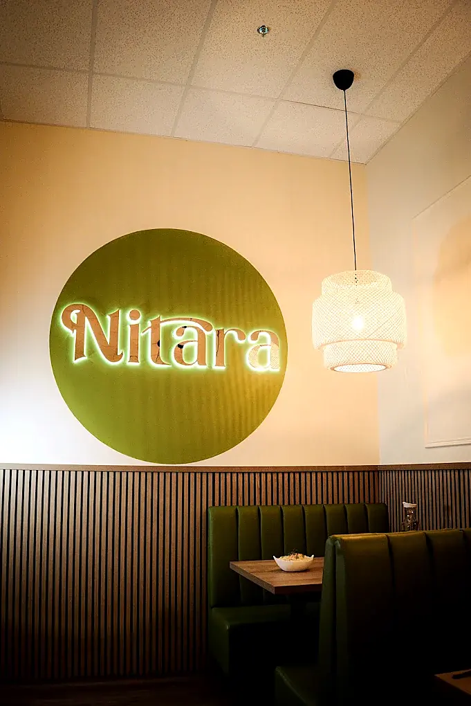 Nitara logo wall inside the restaurant