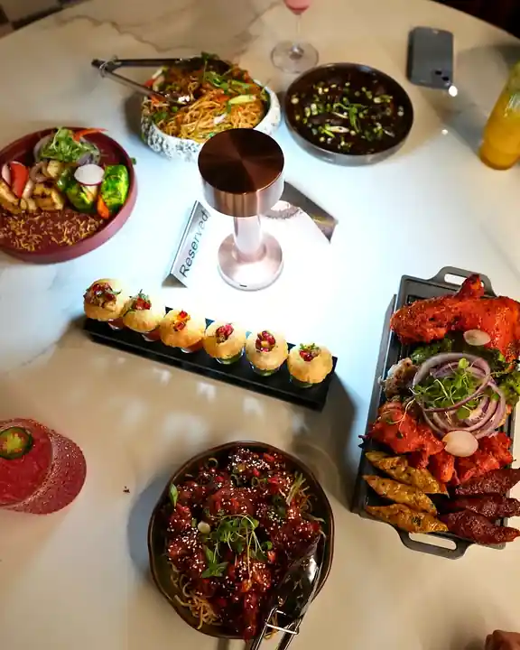 Tamasha chef plating fine cuisine