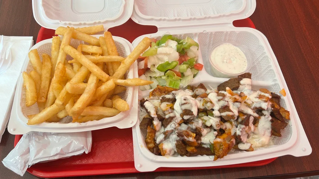 Meal with fries prepared at Everest Momos Hakka Chinese