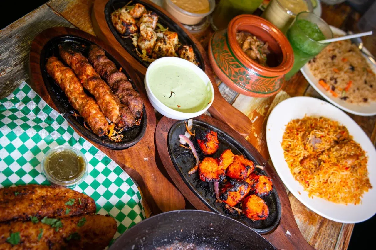 Chenab Pakistani feast with BBQ, rice, sauces and drinks