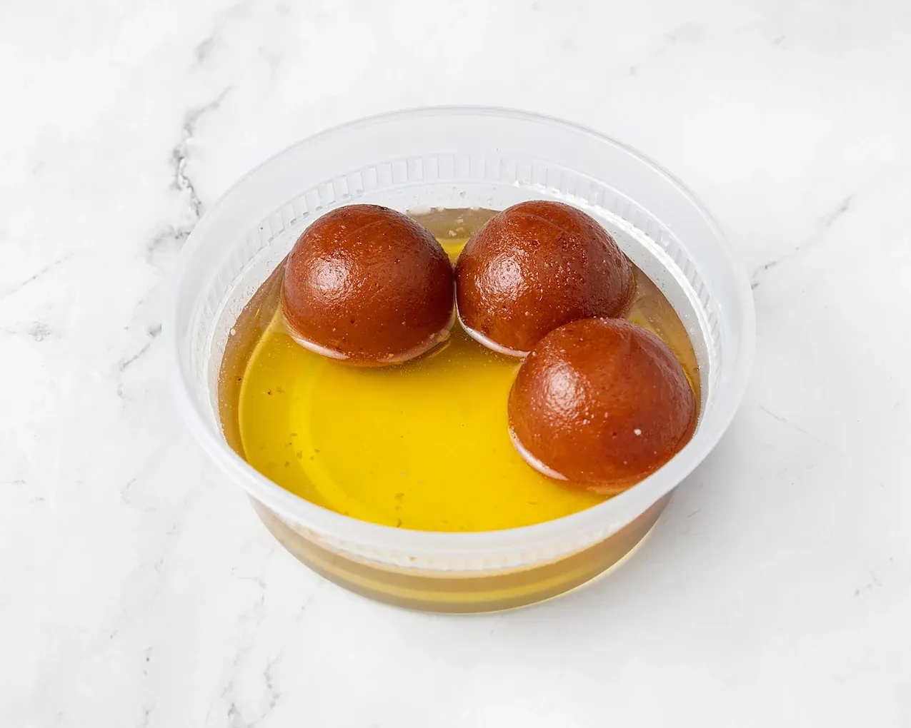 Gulab jamun dessert at Chenab