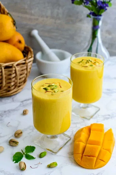 Two glasses of mango lassi