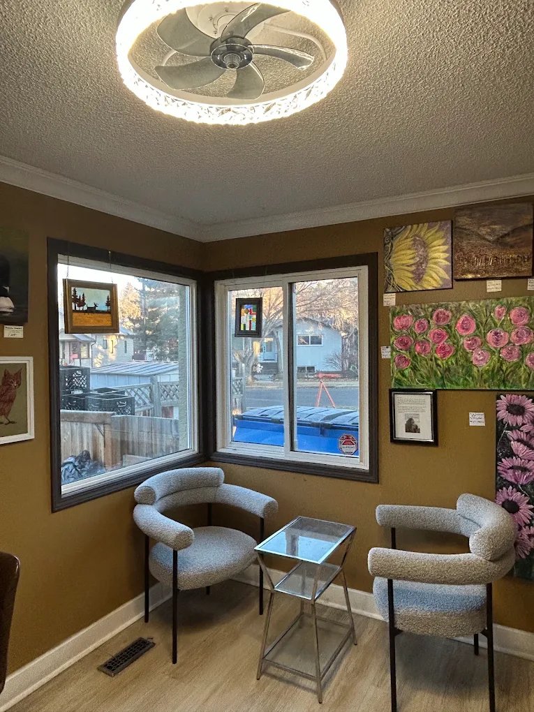 Warm artistic cafe interior with local artwork