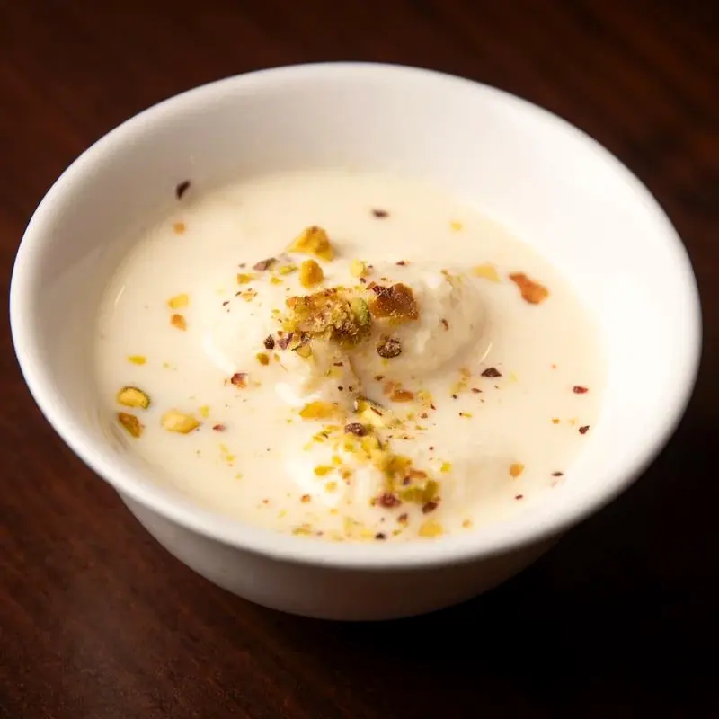 Ras Malai in sweet milk with pistachios